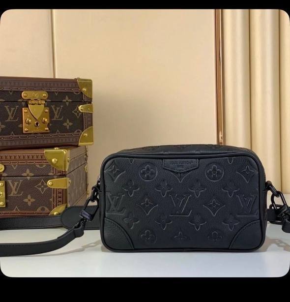 Photo client — Sac Louis Vuitton